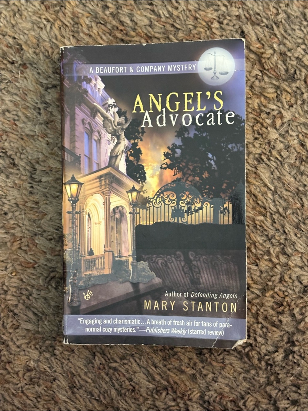 "Angel's Advocate" Paperback Mystery Book - Black/Gold Cover.